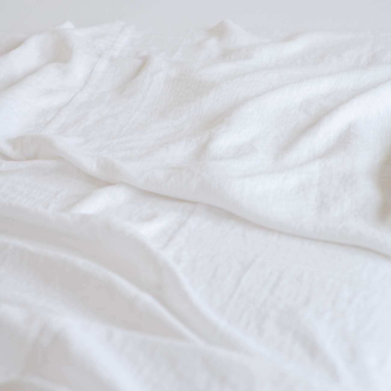 letnji-pokrivac-isprani-lan-beli